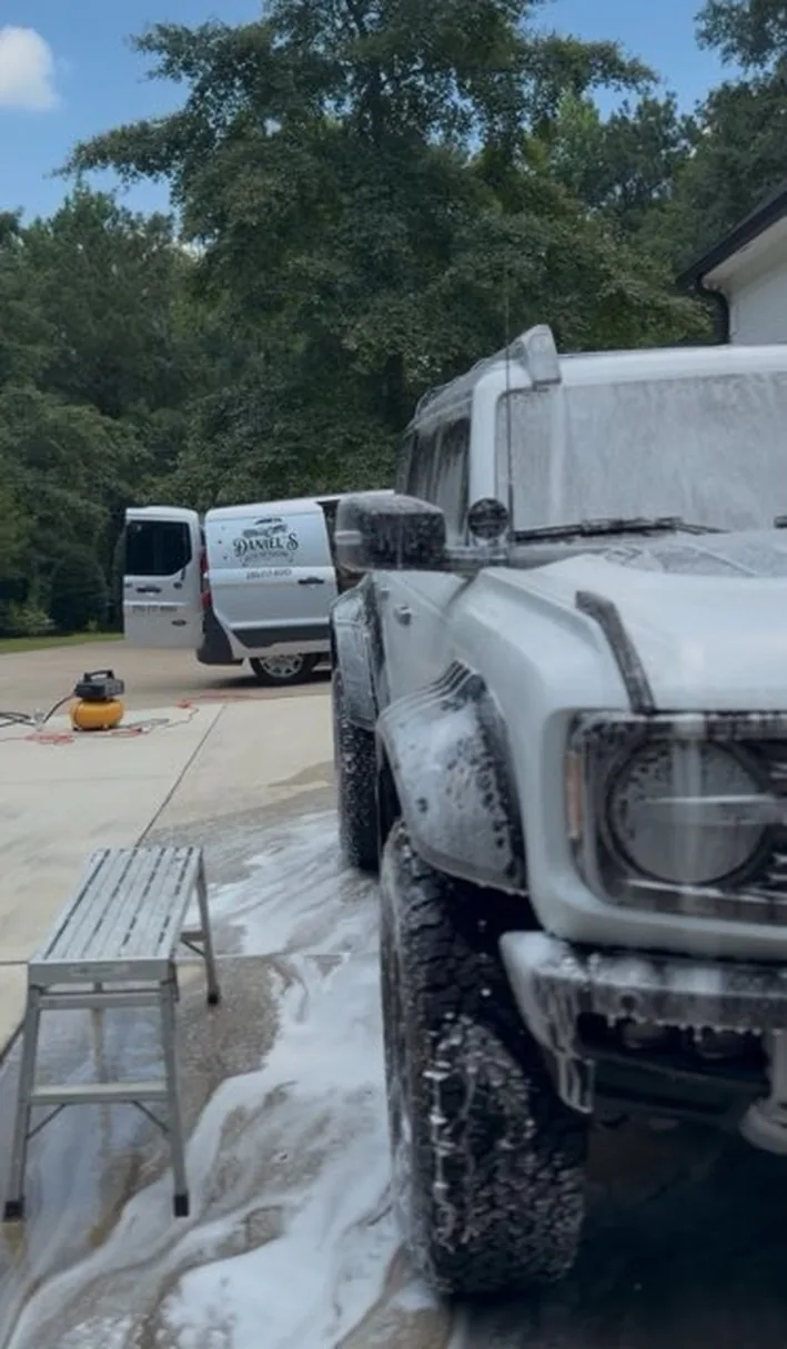Truck under foam before the rinse by Daniel’s Auto Detailing