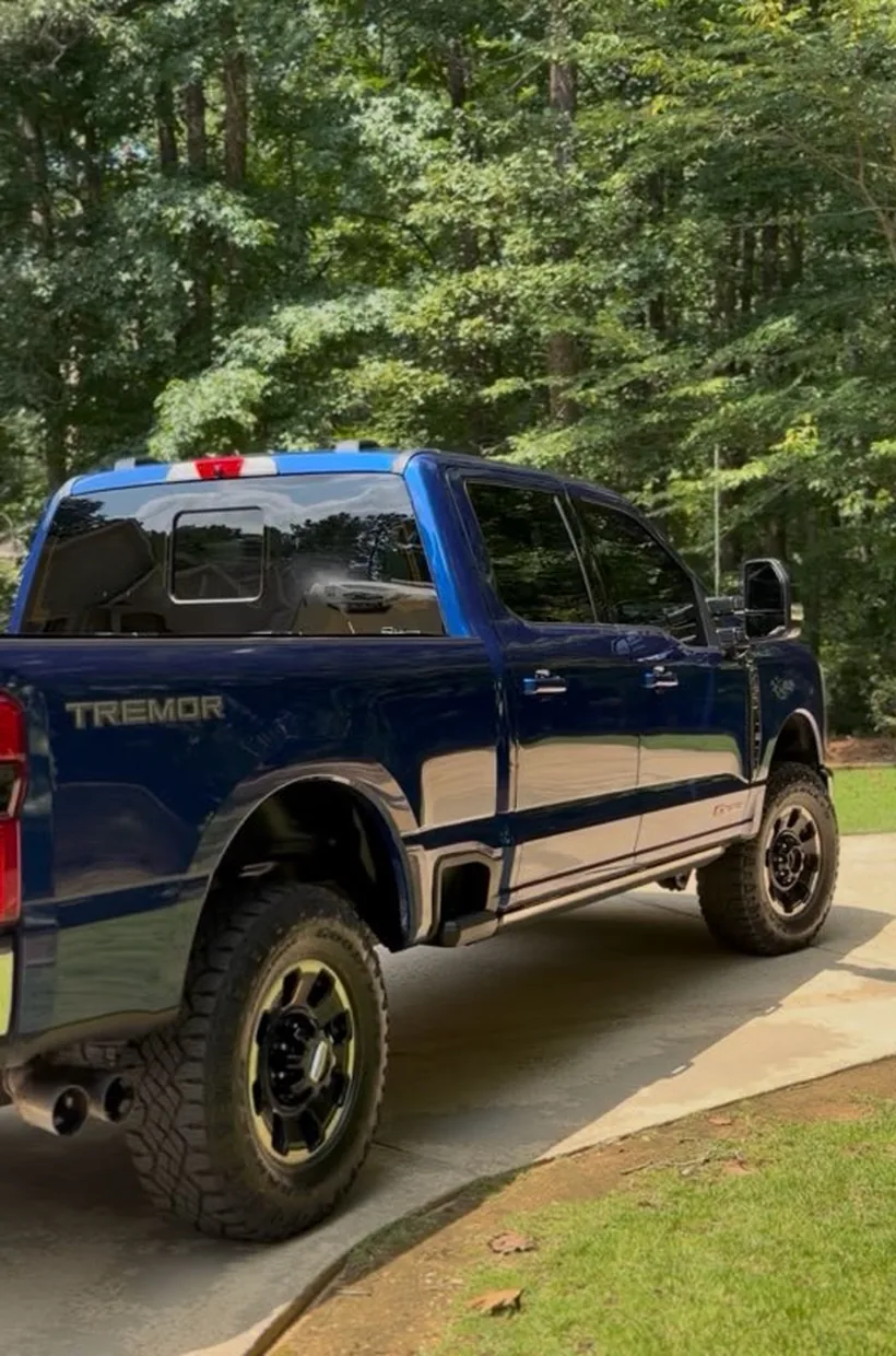Lifted blue Super Duty by Daniel’s Auto Detailing